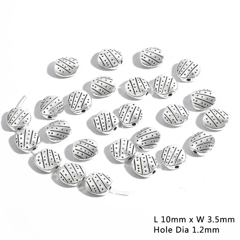 Cuentas espaciadoras de aleación con patrón oblato, mostacillas de metal, 20-30 Uds.