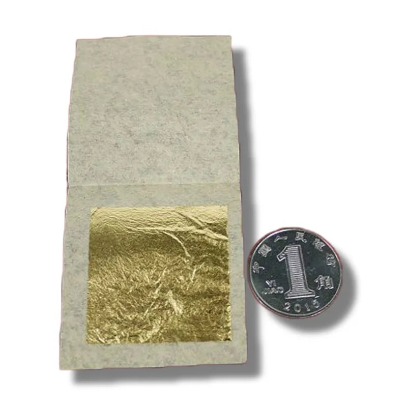 100 Uds. Hoja de oro puro de 24 k 9,33x9,33 cm. Contenido 99% hoja de lámina de oro real
