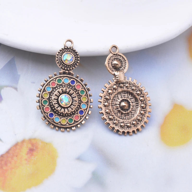 10 unids/lote 33*20mm aleación antigua dorada redonda, imitación diamantes con figuras en esmalte