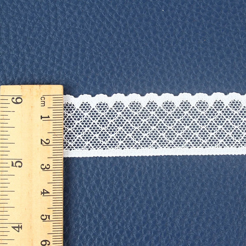 Accesorios de encaje blanco elástico, 1 a 2cm en una yarda (91,44 cm)