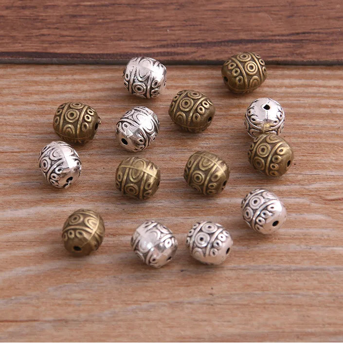 12 Uds. De mostacillas espaciadoras ovaladas de dos colores de 7x7x8mm para joyería artesanal