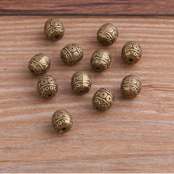 12 Uds. De mostacillas espaciadoras ovaladas de dos colores de 7x7x8mm para joyería artesanal