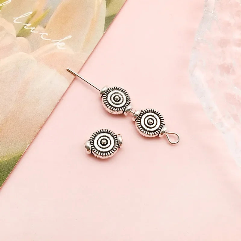 Mostacillas Retro de pentagrama de flor elíptica, joyería de aleación de plata tibetana, 50 piezas