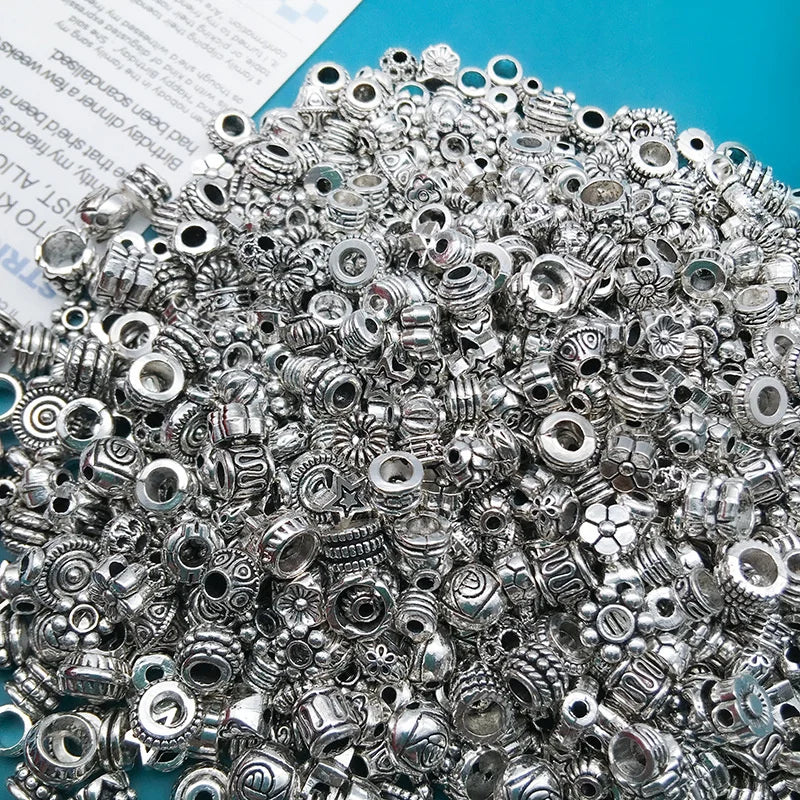 100 Uds. Mostacillas espaciadoras sueltas de aleación de Metal.