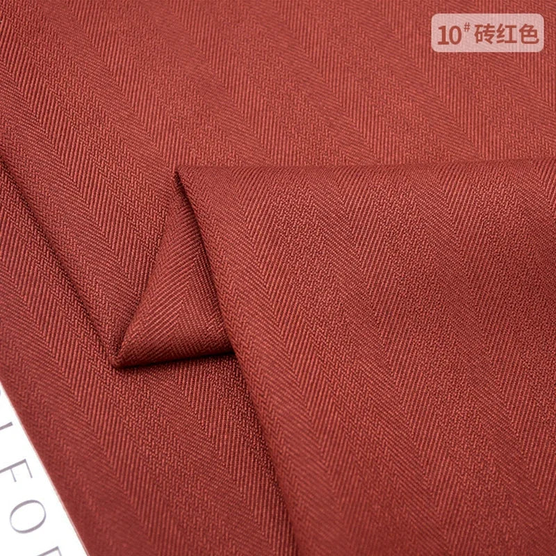 Patrón de espiga, mezcla de lana, tela informal. tela microelástica gruesa