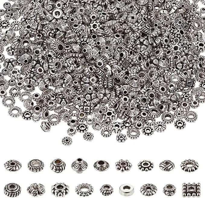 Mezcla de mostacillas (cuentas) espaciadoras de metal de color plata antigua tibetana para fabricación de joyería (180 aprox.)